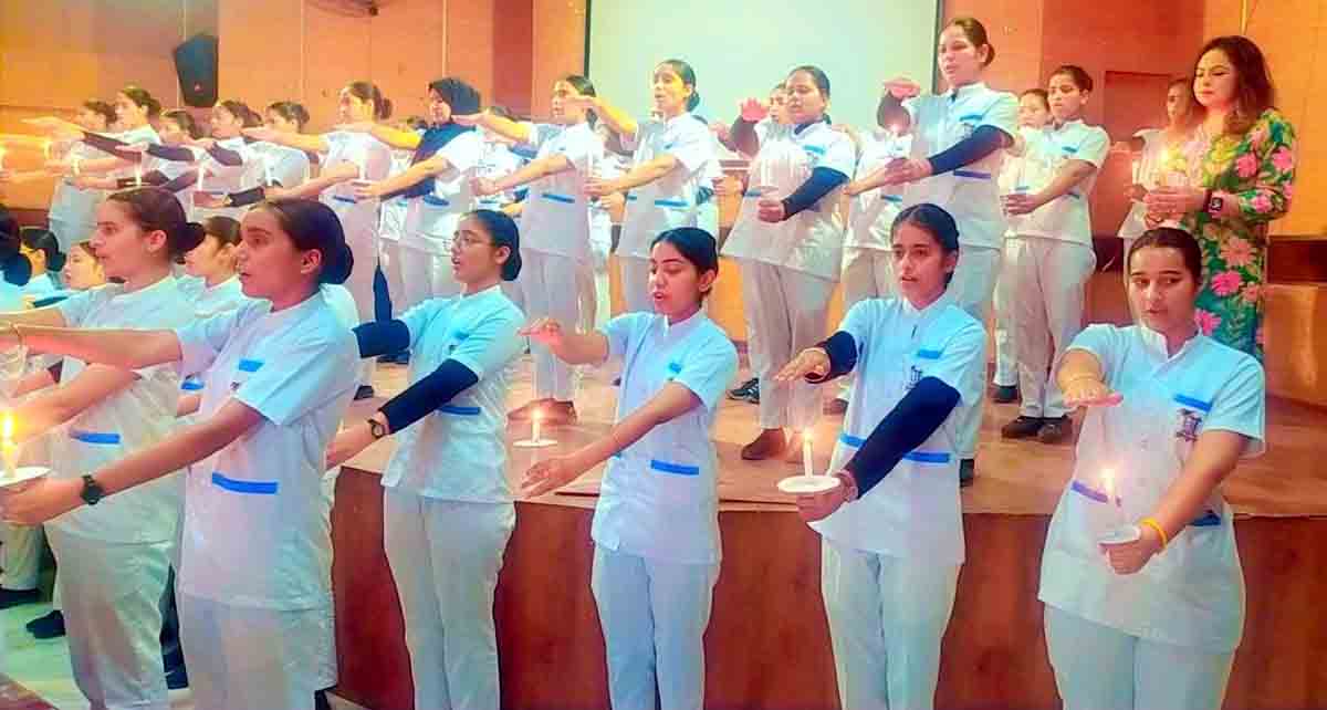 Oath of profession administered to female nursing students in Ratan Group at the commencement of the course